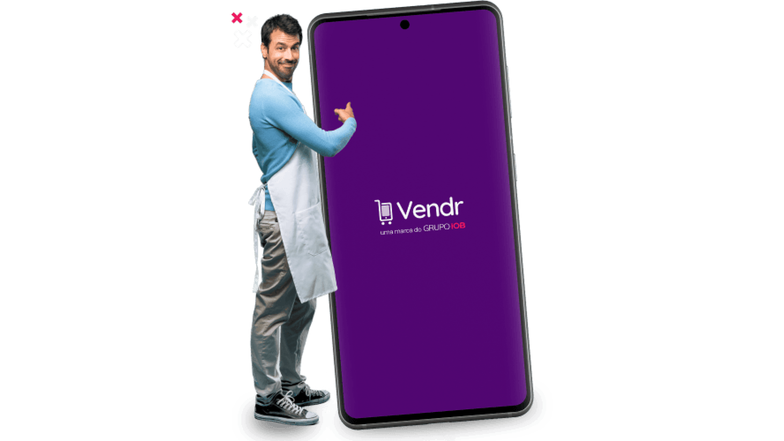 Comerciante apontando para um celular com a tela do Vendr